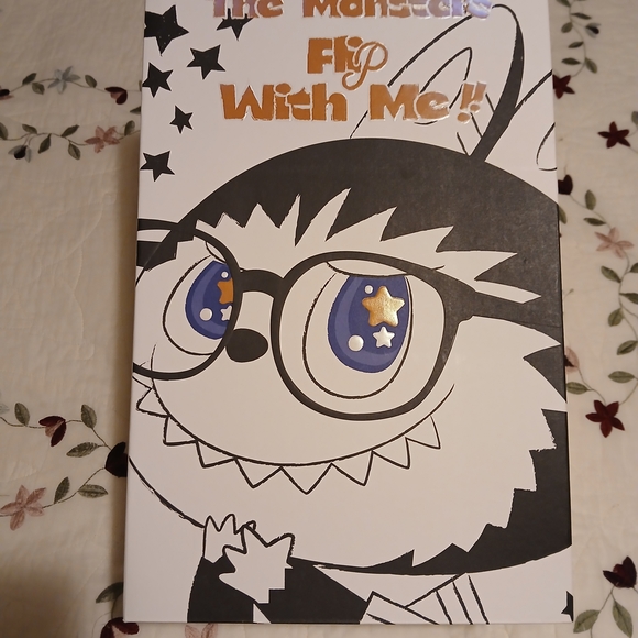 Charming Plush Creature with Striped Blue Shirt - Picture 3 of 10